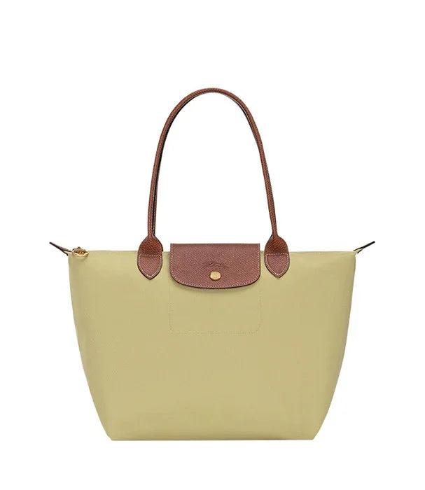 תיק יד לנשים בצבע בז' עם ידיות ועיטורים חומים, עיצוב יוקרתי מחנות CHOZEN