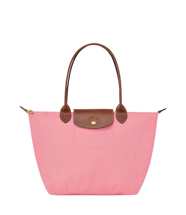 תיק יד ורוד עם ידיות חומות, מוצר אופנה יוקרתי מקבוצת אלפא ב-CHOZEN