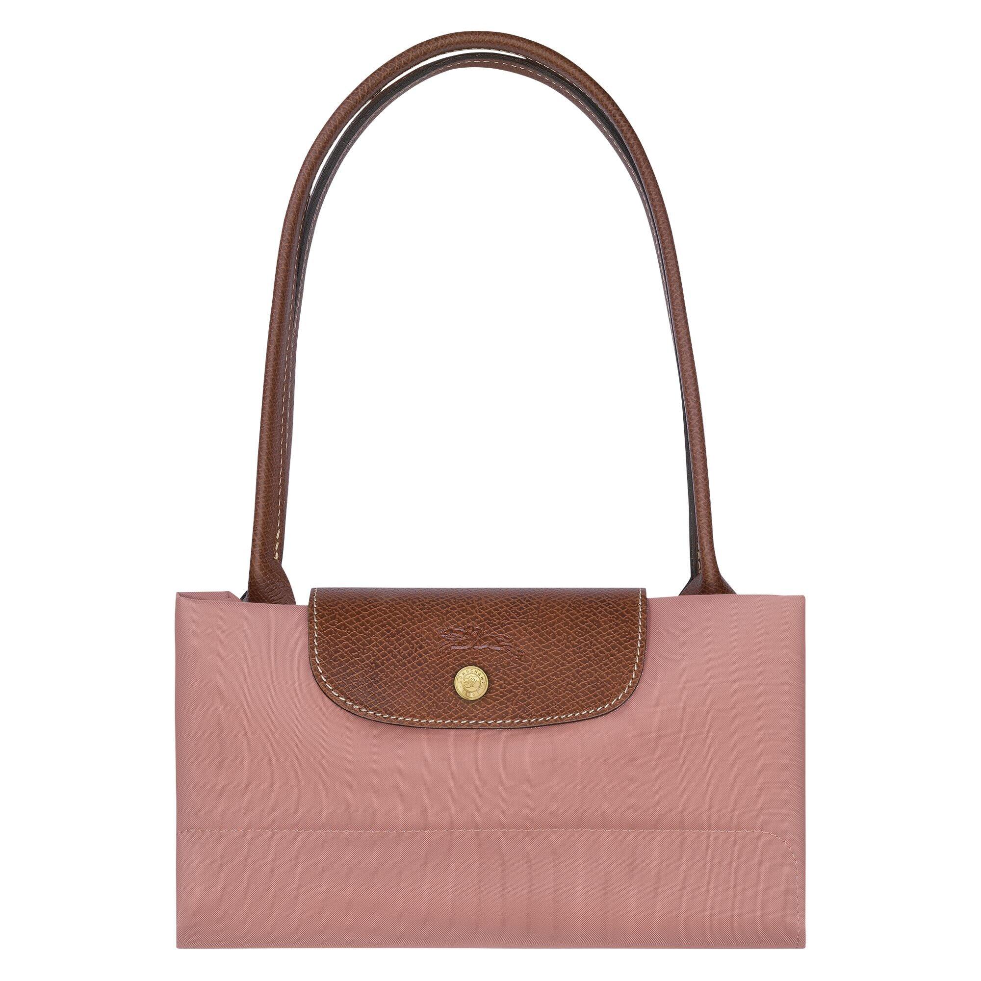 תיק יד ורוד עם רצועה חומה ומכסה עור, קולקציית מותגים CHOZEN