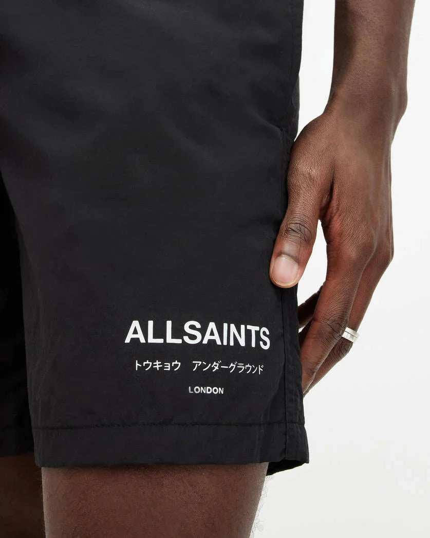 מכנסי ALLSAINTS שחורים, לוגו מותג מוביל, פרטי עיצוב ייחודיים מבית קבוצת אלפא