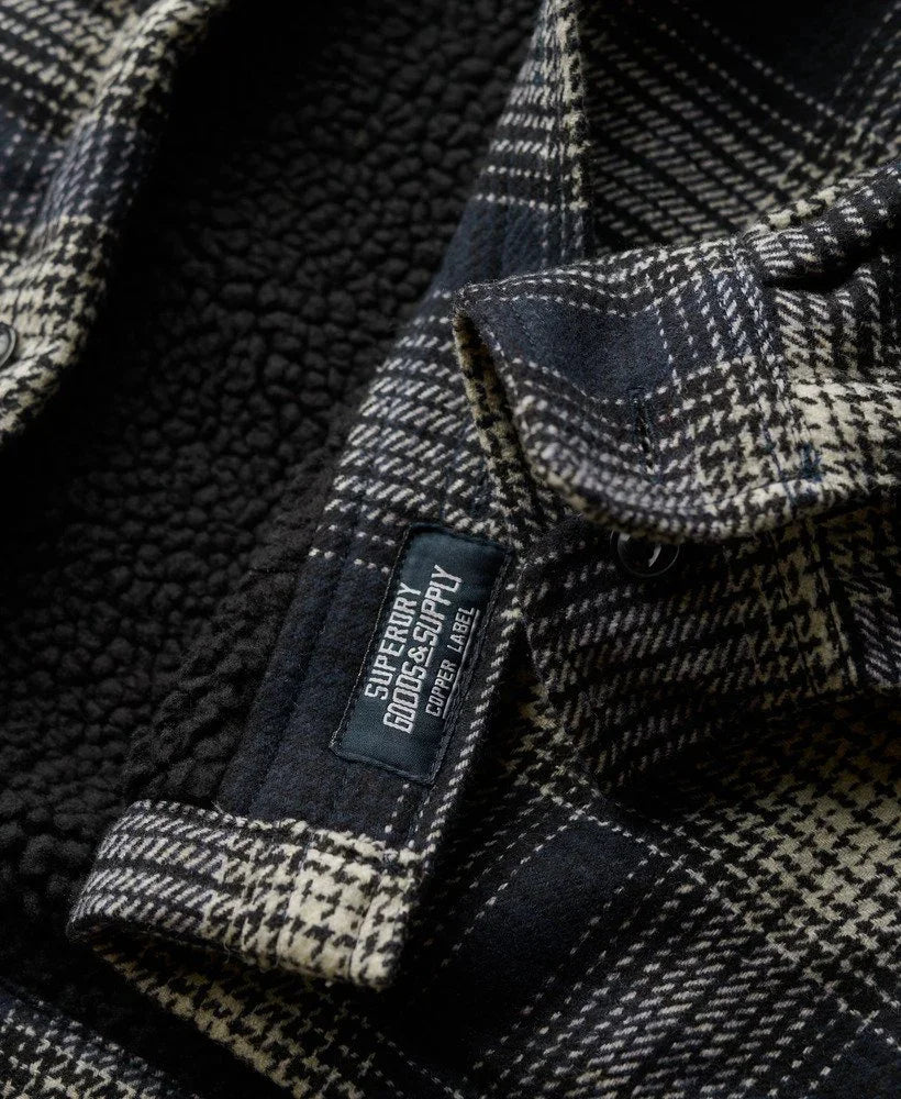 מעיל פלאנל משובץ שחור לבן מבית SUPERIOR GOODS SUPPLY, צילום מקרוב, CHOZEN אלפא מותגים מובילים