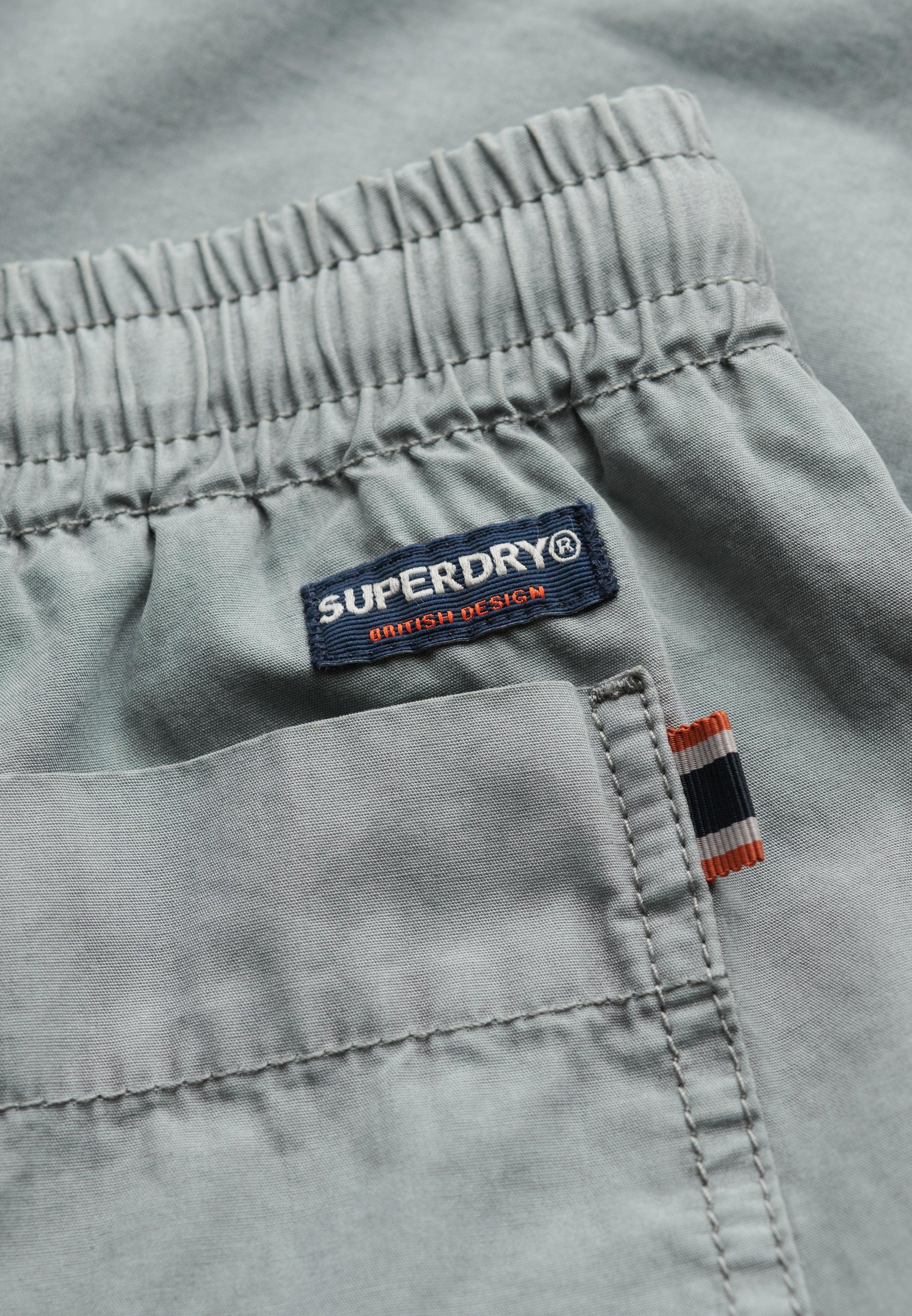 מכנסי סופרדריי אפורים עם גומי ומיתוג SUPERDRY, פרטים איכותיים, מתוך CHOZEN יבואן רשמי