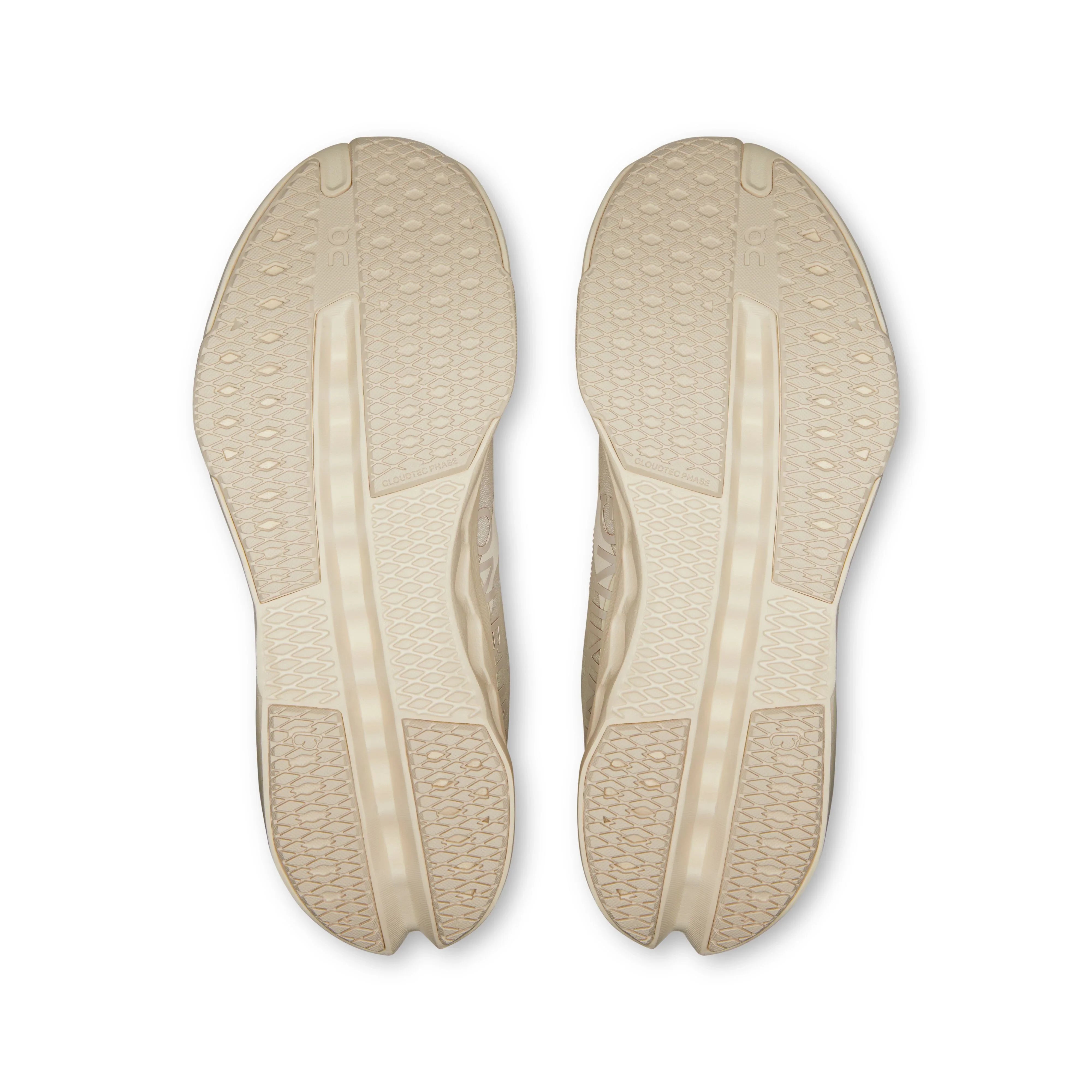 סוליות נעלי ריצה בצבע בז', צילום מלמעלה, דגם ON Cloudsurfer, CHOZEN קבוצת אלפא