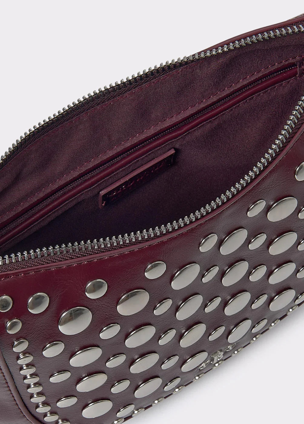 פנים תיק אלגנטי בורדו עם ניטים כסופים, רוכסן פנימי, מבית CHOZEN