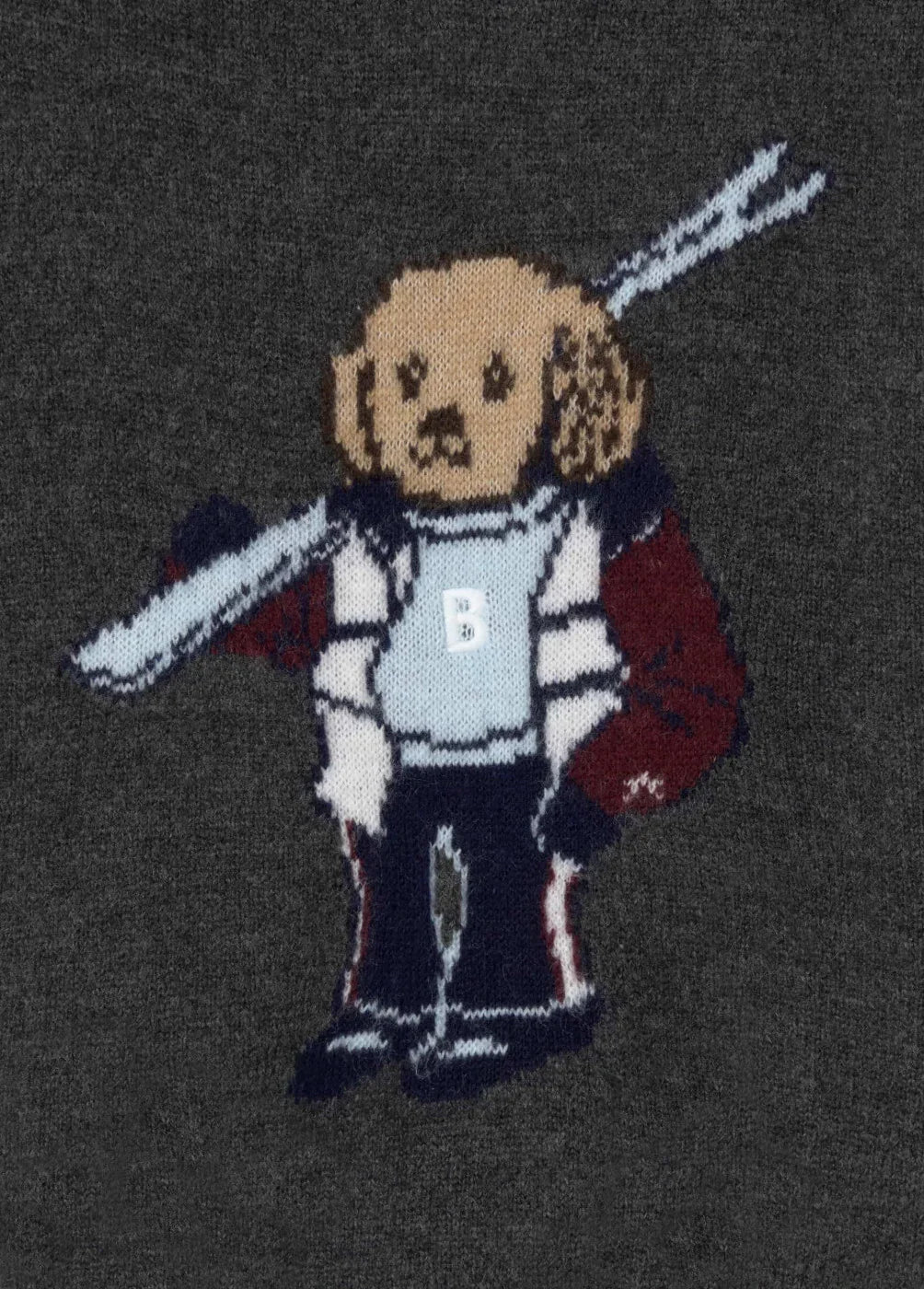 איור של דמות כלב אבירי סרוג על סוודר כהה, אופנת CHOZEN, קבוצת אלפא