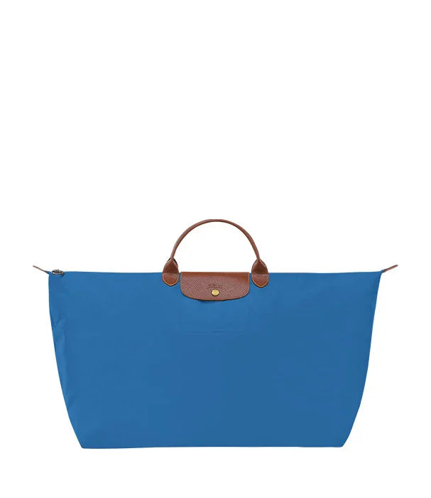 תיק יד כחול עם ידית עור חומה, אביזר אופנה יוקרתי באתר CHOZEN