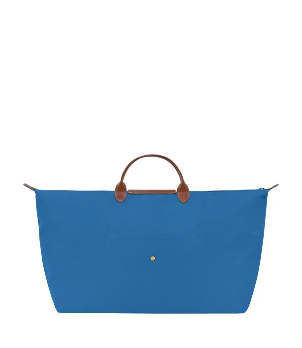 תיק נסיעות כחול עם ידיות עור חום מבית CHOZEN, מותגים מובילים ביבוא קבוצת אלפא