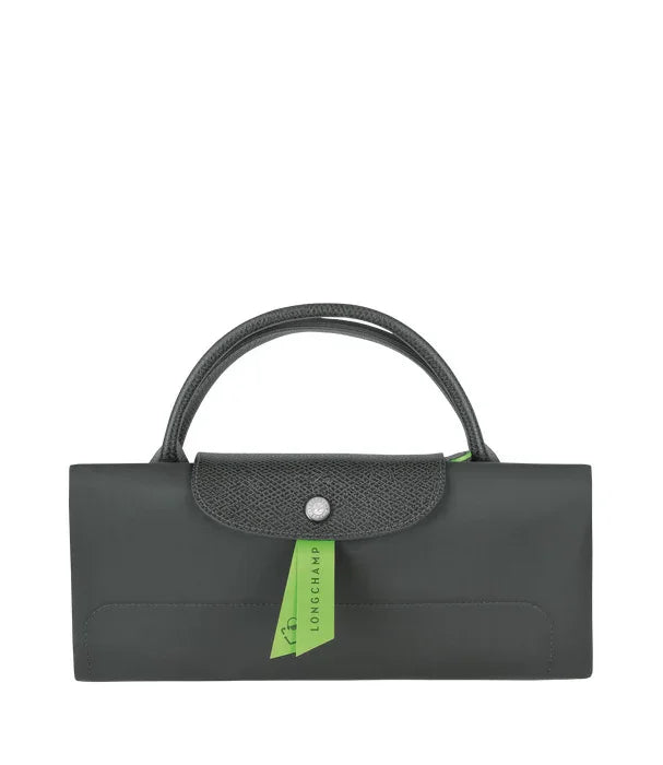 תיק יד שחור קלאסי לנשים של LONGCHAMP, מעוצב עם ידיות קצרות ותווית ירוקה בולטת
