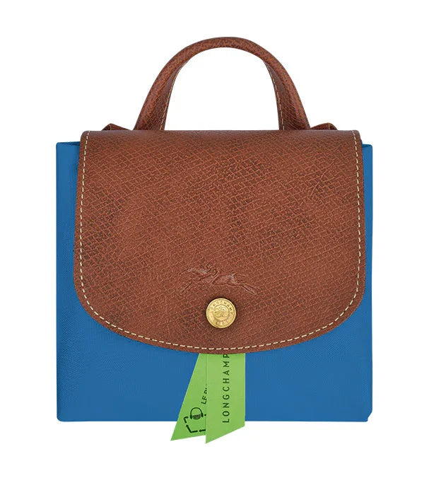 תיק יד לונגשמפ כחול עם דש עור חום, תיוג ירוק, מבית קבוצת אלפא CHOZEN