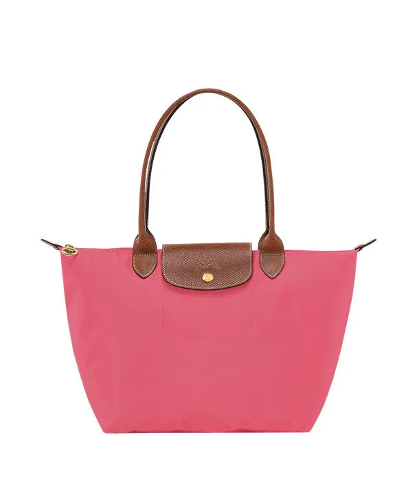 תיק יד ורוד עם רצועות עור חום, מותג יוקרה לנשים בחנות CHOZEN