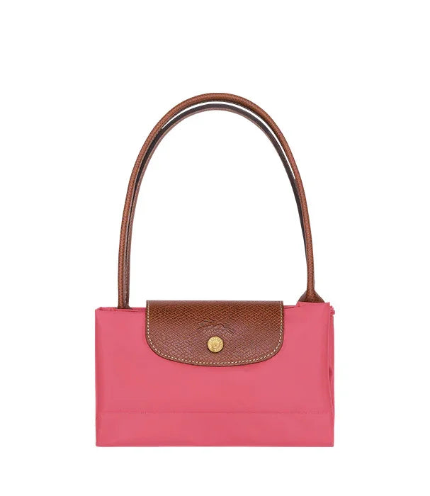תיק ורוד עם ידיות חום ועיצוב קלאסי, מותג יוקרה ב-CHOZEN קבוצת אלפא