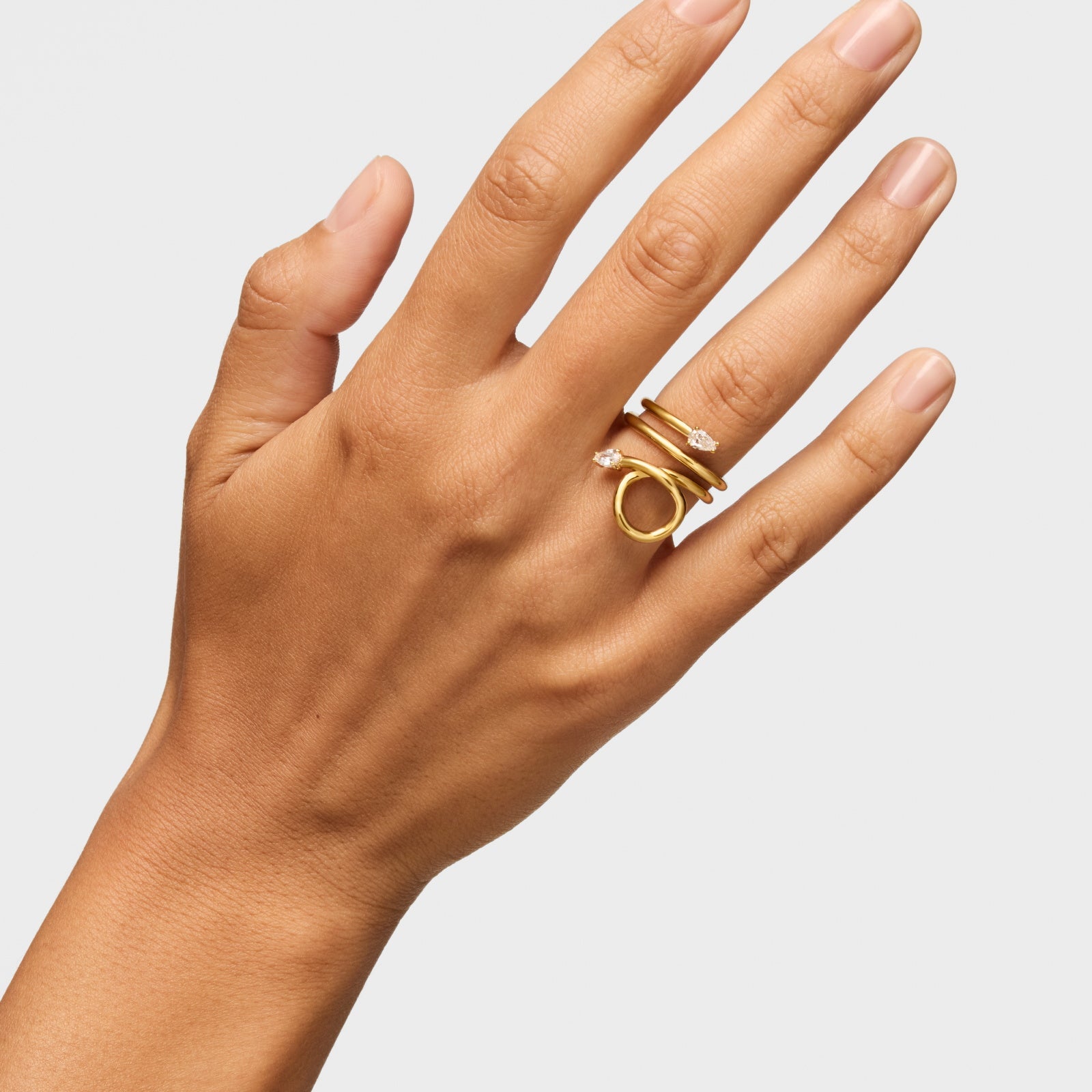 טואוס טבעת ספירלה בשיבוץ יהלומי מעבדה Lio LGD מכסף ועליו זהב 18 קראט