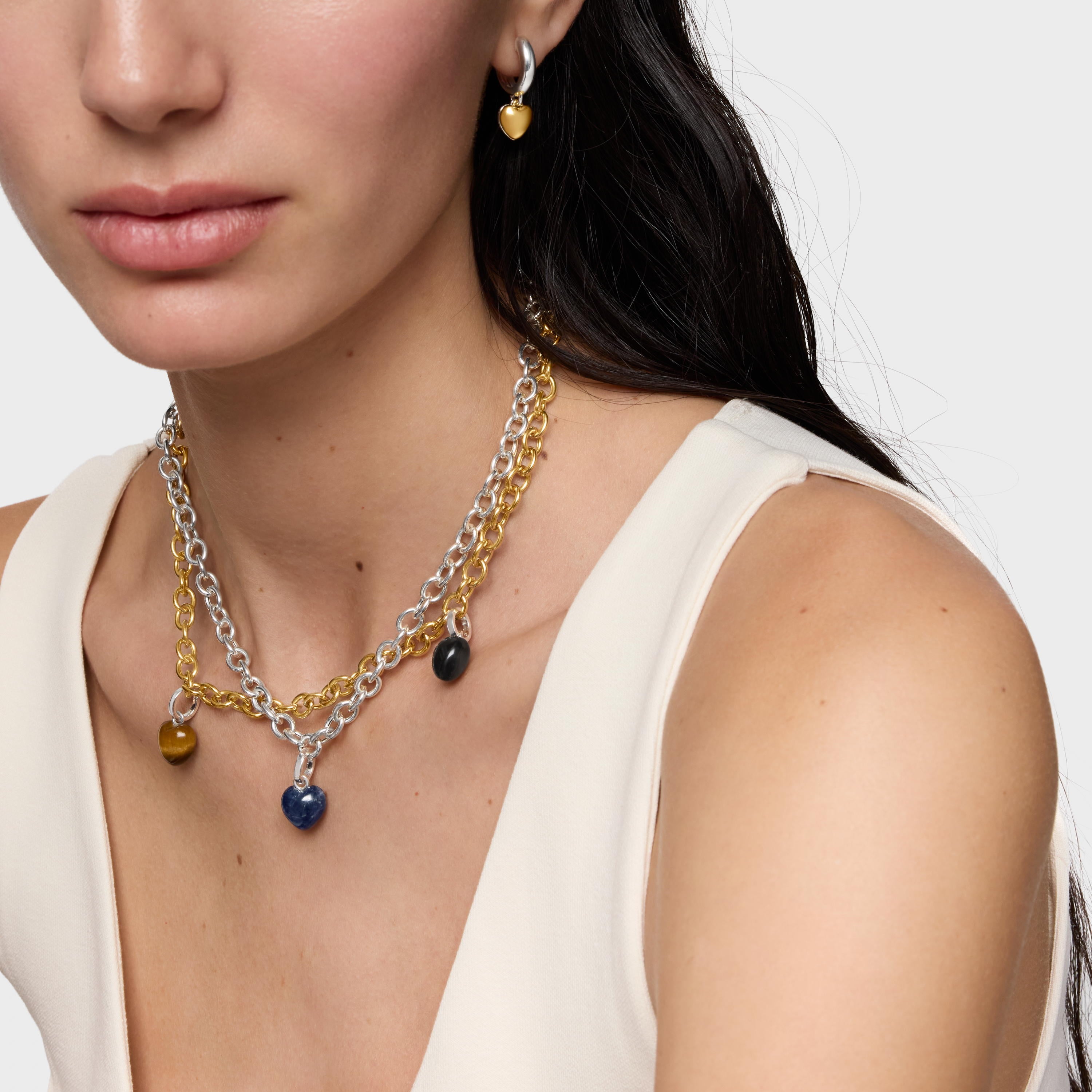 טואוס צ'ארם במוטיב לב מאבן חן Flechazo מכסף