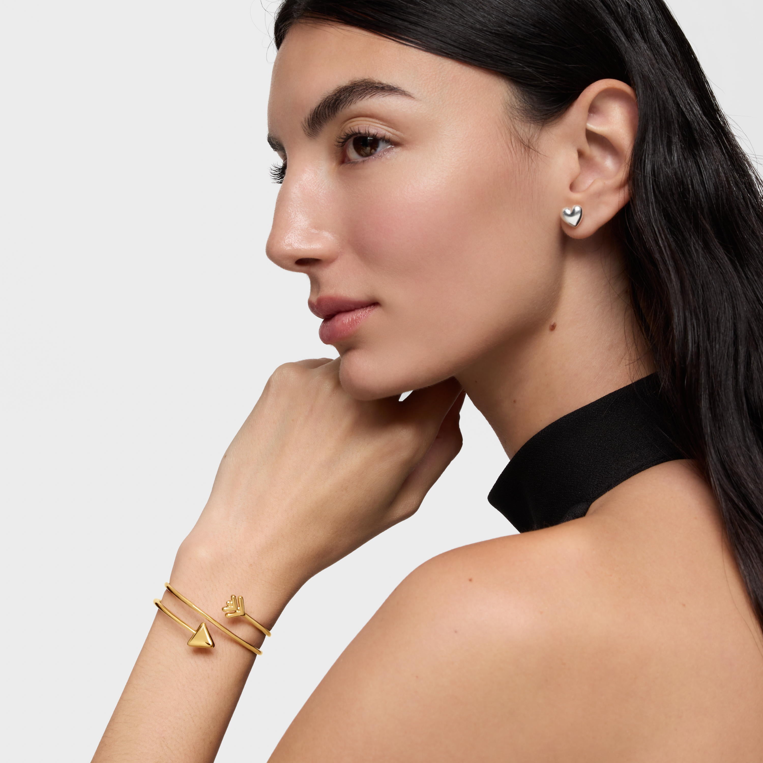 טואוס צמיד בנגל עם מוטיב חץ Flechazo מכסף ועליו זהב 18 קראט