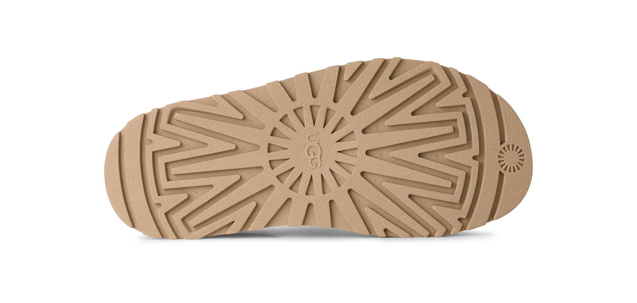 סוליית מגף UGG בז׳ עם דוגמה גיאומטרית מובלטת, מתאימה לאחיזה ועמידות