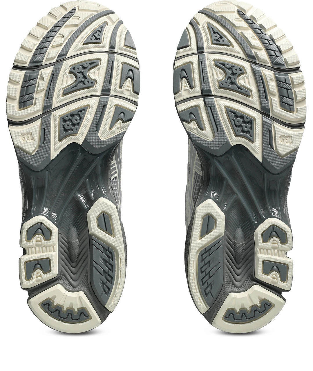 סוליות נעליים אפורות עם דוגמת אחיזה ייחודית, עיצוב ספורטיבי לריצה או הליכה