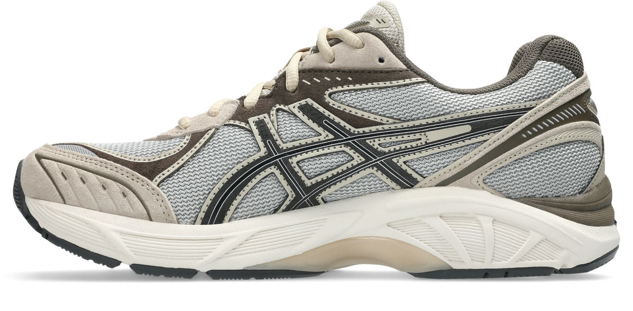 נעל ספורט אפורה עם רשת, סוליה עבה, קווים שחורים ולוגו צד, לנשים ולגברים