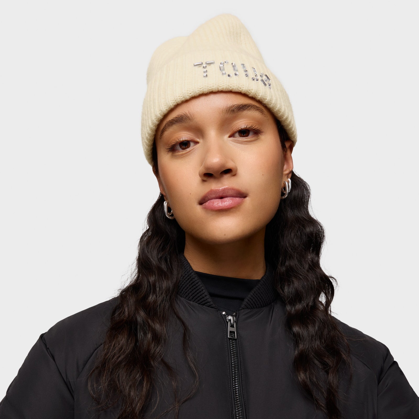 טואוס כובע צמר Crystal בצבע בז'