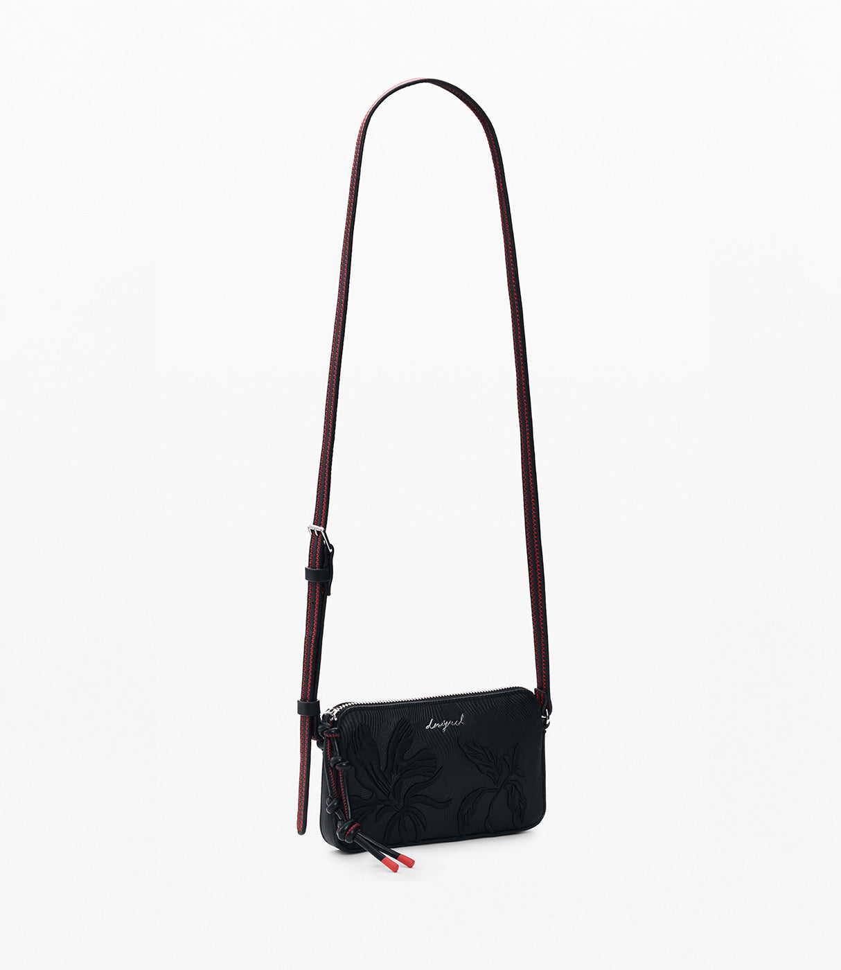 תיק צד קטן לנשים בצבע שחור עם דוגמא פרחונית מובלטת וידית כתף ארוכה, רקע לבן