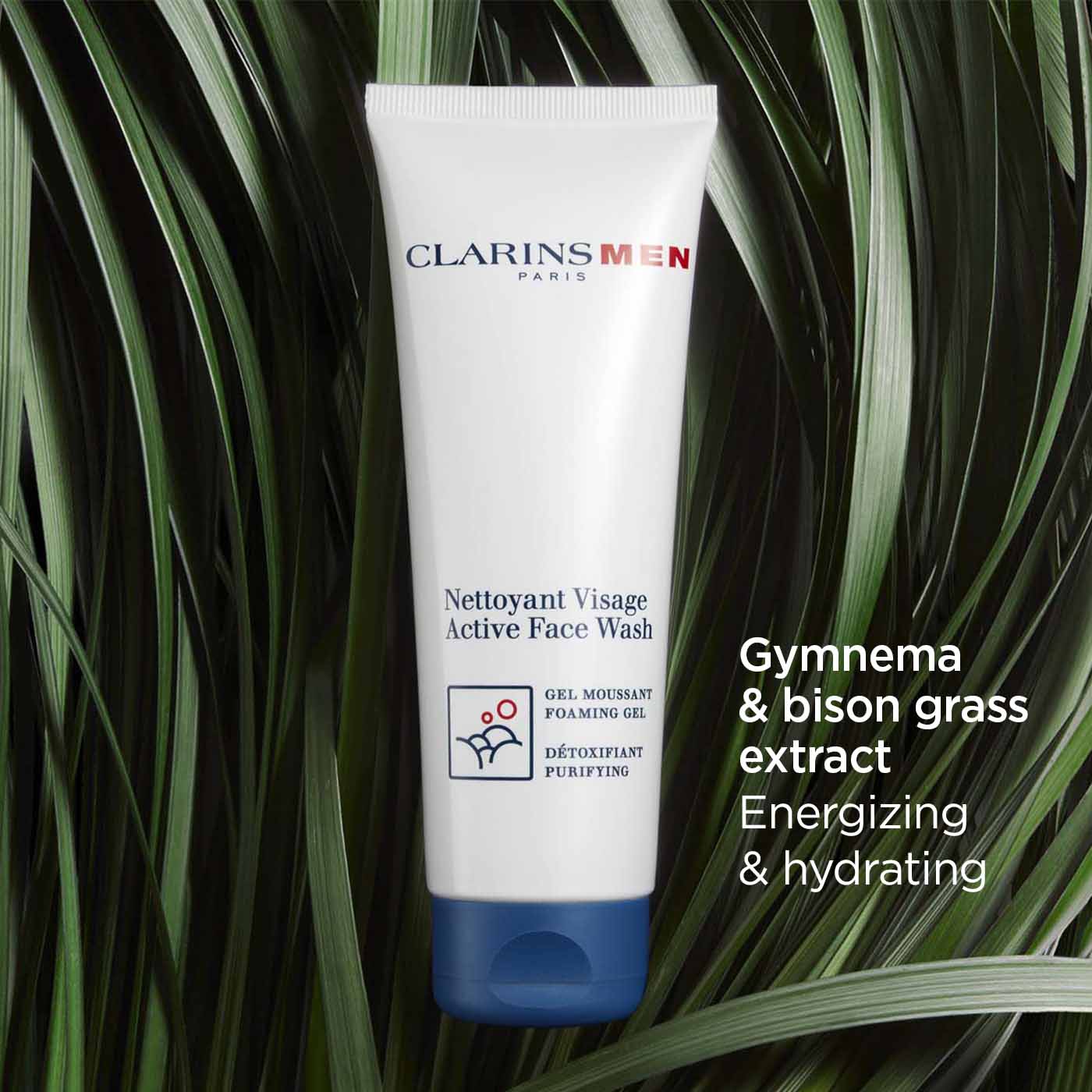 ג'ל ניקוי פנים לגבר קלרינס על רקע עלים ירוקים, מכיל תמצית גימנמה ועשב ביזון