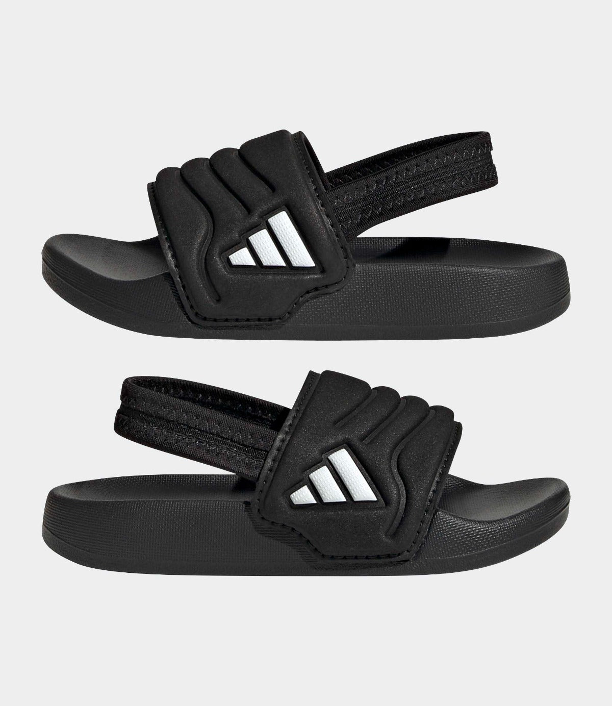סנדלי ילדים שחורים עם רצועת סקוץ' ולוגו לבן, מתאימים לקיץ ונוחים ליום יום