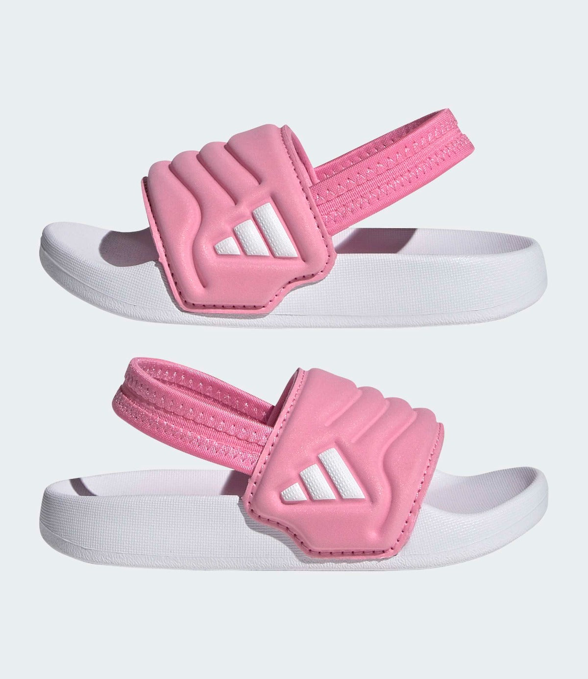 סנדלים לילדות בצבע ורוד ולבן, רצועה רחבה עם עיצוב מודרני וחלק אחורי גמיש