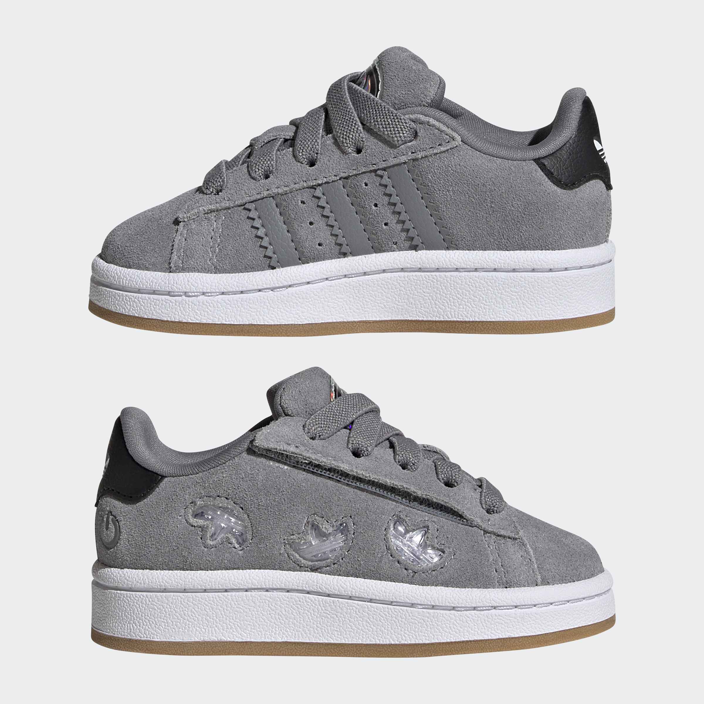 נעלי סניקרס ילדים אפורות מעור זמש, עם סוליה לבנה ודוגמאות ייחודיות בצד